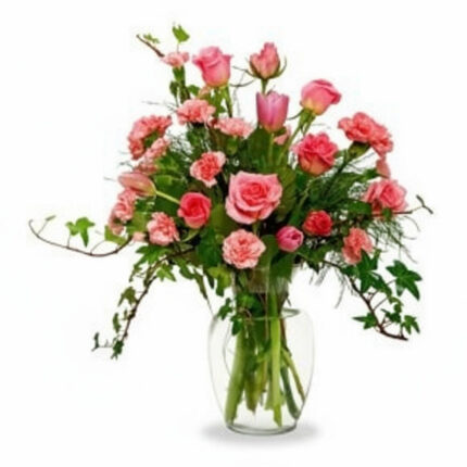 A beautiful bouquet of pink roses in a clear glass vase.