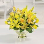Golden Anniversary flower bouquet with yellow roses and lilies by Reema Florist Nashville