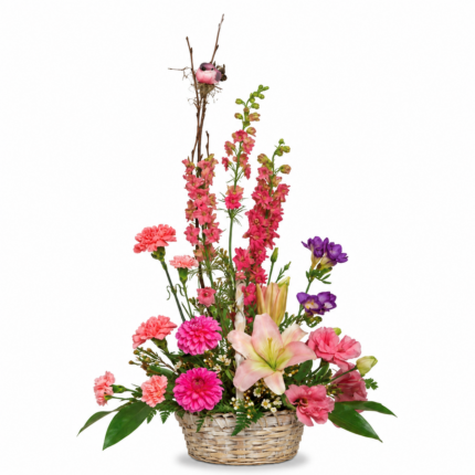 A vibrant floral arrangement with pink, purple, and red flowers.