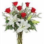 Elegant bouquet with red roses and white lilies.