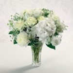 Silver anniversary flower arrangement with white roses and silver eucalyptus Nashville TN