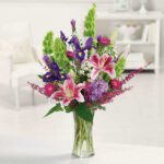 Pink stargazer lily bouquet hand-tied by Reema Florist in Nashville