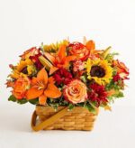 Bright autumn flower arrangement in a basket.