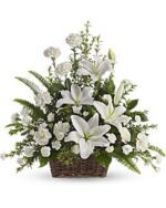 Elegant white floral arrangement in a woven basket.