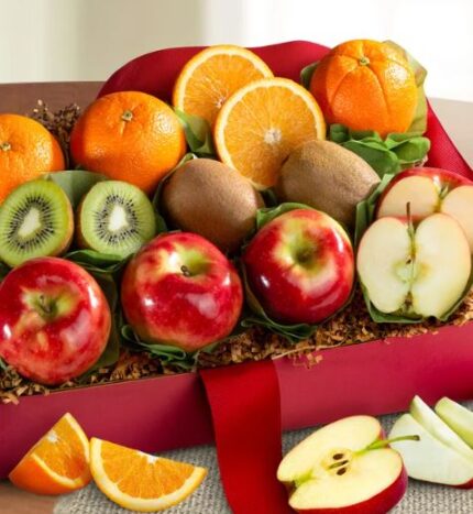 A premium "Arbor Harvest" medium fruit gift box featuring a variety of fresh fruits including red apples, oranges, and kiwis, arranged in a red decorative box with a ribbon.