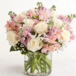 Elegant blush flower bouquet with pink roses and greenery from Reema Flower Shop Nashville TN