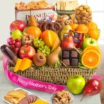 Mother's Day fruit and sweets gift basket with flowers by Reema Florist Nashville TN
